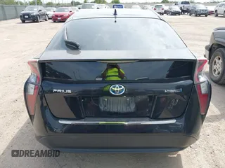 2016 Toyota Prius Two z VIN JTDKBRFU4G3509129, wystawiony jako IAAI lot #42321562 z przebiegiem 246 582 mil mil oraz . Historia ofert i sprzedaży dostępna na DreamBid. Obrazek 16.