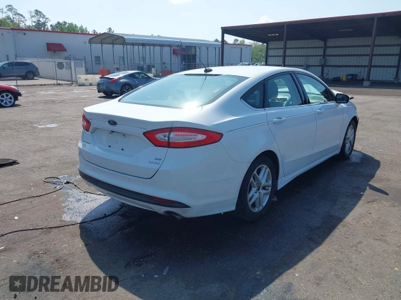 2016 Ford Fusion SE with VIN 3FA6P0HDXGR403268, listed as a IAAI auction lot 41936911 with 165,074 mi miles. Bid and sale history available at carsss.com. Image 4.