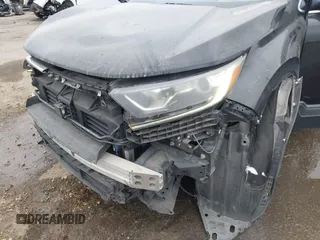 2017 Honda CR-V EX with VIN 7FARW1H59HE007171, listed as a IAAI auction lot 42033941 with 134,227 mi miles and . Bid and sale history available at carsss.com. Image 6.