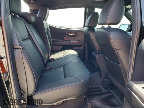 2023 Toyota Tacoma SR with VIN 3TMCZ5AN3PM571922, listed as a Copart auction lot 61872775 with 34,501 mi miles and Salvage title. Bid and sale history available at DreamBid. Image 10.
