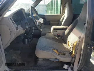 1999 Ford Ranger XL with VIN 1FTYR10V7XPB92187, listed as a Copart auction lot 74777804 with 295,206 mi miles and Salvage Title. Bid and sale history available at carsss.com. Image 7.