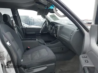 2005 Ford Explorer Sport Trac XLS z VIN 1FMZU67K85UA47665, wystawiony jako IAAI lot #41559468 z przebiegiem 124 061 mil mil oraz . Historia ofert i sprzedaży dostępna na DreamBid. Obrazek 5.