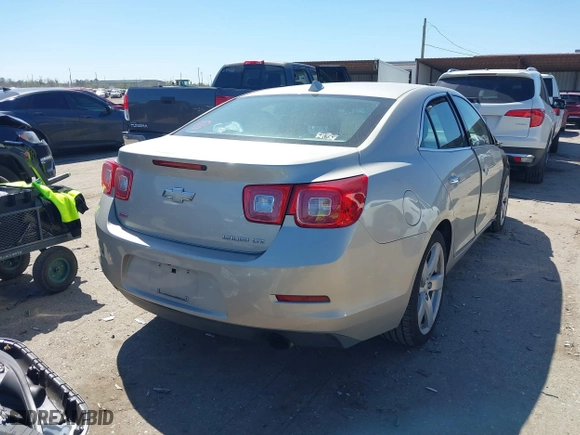 2014 Chevrolet Malibu LTZ with VIN 1G11J5SX6EF176489, listed as a IAAI auction lot 41762393 with 107,623 mi miles. Bid and sale history available at carsss.com. Image 4.
