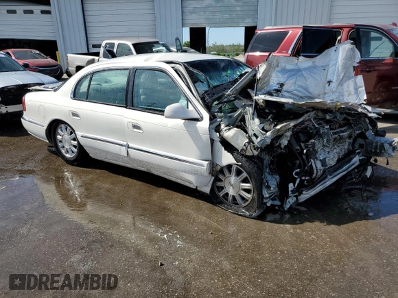 1999 Lincoln Continental with VIN 1LNHM97VXXY680512, listed as a Copart auction lot 58444304 with Not provided miles and Non repairable. Bid and sale history available at DreamBid. Image 4.