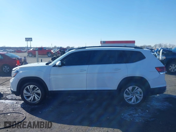 2021 Volkswagen Atlas SE z VIN 1V2WR2CA4MC514968, wystawiony jako IAAI lot #41414547 z przebiegiem 133 946 mil mil oraz . Historia ofert i sprzedaży dostępna na DreamBid. Obrazek 14.
