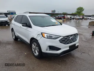 2019 Ford Edge SEL z VIN 2FMPK3J97KBB87631, wystawiony jako IAAI lot #42161578 z przebiegiem 61 336 mil mil oraz . Historia ofert i sprzedaży dostępna na DreamBid. Obrazek 1.