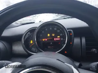 2017 MINI Convertible Cooper S z VIN WMWWG9C38H3C81071, wystawiony jako IAAI lot #41522738 z przebiegiem 59 040 mil mil oraz . Historia ofert i sprzedaży dostępna na DreamBid. Obrazek 7.