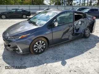 2021 Toyota Prius LE z VIN JTDKAMFP6M3190117, wystawiony jako Copart lot #52938355 z przebiegiem 39 569 mil mil oraz Szkoda całkowita • Salvage title. Historia ofert i sprzedaży dostępna na DreamBid. Obrazek 1.