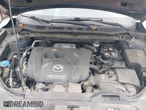 2014 Mazda CX-5 Grand Touring with VIN JM3KE2DY8E0425258, listed as a IAAI auction lot 42179452 with 132,137 mi miles. Bid and sale history available at carsss.com. Image 10.