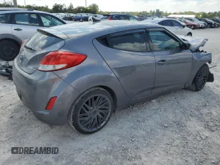 2014 Hyundai Veloster with VIN KMHTC6AD2EU216209, listed as a Copart auction lot 68901093 with 106,189 mi miles and Salvage title. Bid and sale history available at DreamBid. Image 3.