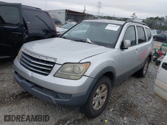 2009 Kia Borrego LX with VIN KNDJJ741395023592, listed as a IAAI auction lot 41554393 with 428,680 mi miles. Bid and sale history available at carsss.com. Image 2.