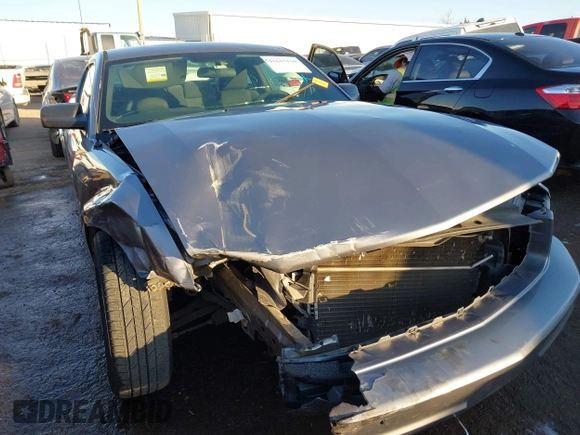 2007 Ford Mustang Deluxe z VIN 1ZVFT80N975302845, wystawiony jako IAAI lot #41615150 z przebiegiem Nie podano mil oraz . Historia ofert i sprzedaży dostępna na DreamBid. Obrazek 6.