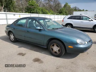 1997 Ford Taurus GL with VIN 1FALP52U4VA323402, listed as a Copart auction lot 65742235 with 43,415 mi miles and Clean title. Bid and sale history available at DreamBid. Image 4.