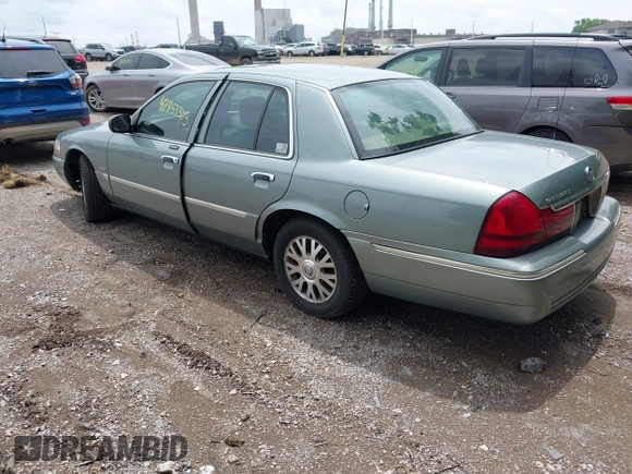 2005 Mercury Grand Marquis LS Premium z VIN 2MHHM75W95X607697, wystawiony jako IAAI lot #42453303 z przebiegiem 142 879 mil mil oraz . Historia ofert i sprzedaży dostępna na DreamBid. Obrazek 3.