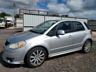 2012 Suzuki SX4 Sportback with VIN JS2YA5A58C6300304, listed as a Copart auction lot 79958624 with 57,585 mi miles and Clean Title. Bid and sale history available at carsss.com. Image 1.