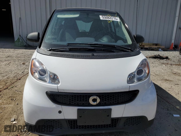 2015 Smart fortwo Passion z VIN WMEEJ3BA0FK802623, wystawiony jako Copart lot #55082215 z przebiegiem Nie podano mil oraz Tytuł czysty. Historia ofert i sprzedaży dostępna na DreamBid. Obrazek 5.
