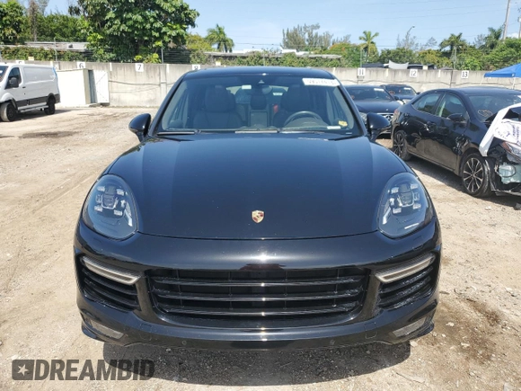 2017 Porsche Cayenne GTS with VIN WP1AD2A29HLA81318, listed as a Copart auction lot 59517413 with 77,363 mi miles and . Bid and sale history available at DreamBid. Image 5.