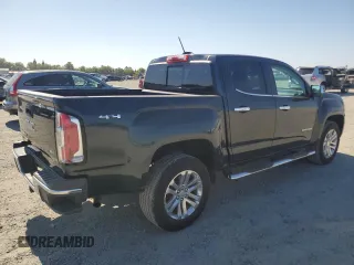 2018 GMC Canyon 4WD SLT with VIN 1GTG6DEN4J1219631, listed as a Copart auction lot 62603815 with 37,384 mi miles and Salvage title. Bid and sale history available at DreamBid. Image 3.