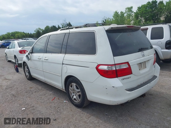 2007 Honda Odyssey EX-L with VIN 5FNRL38787B051582, listed as a IAAI auction lot 42104718 with 193,630 mi miles and . Bid and sale history available at DreamBid. Image 3.