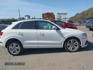 2017 Audi Q3 Premium with VIN WA1ECCFS9HR005867, listed as a IAAI auction lot 42144051 with 87,552 mi miles and . Bid and sale history available at DreamBid. Image 13.