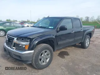2010 GMC Canyon SLE1 z VIN 1GTJTCDEXA8109443, wystawiony jako IAAI lot #42240716 z przebiegiem 160 500 mil mil oraz . Historia ofert i sprzedaży dostępna na DreamBid. Obrazek 2.