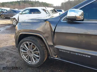 2014 Jeep Grand Cherokee Overland with VIN 1C4RJFCT8EC183165, listed as a IAAI auction lot 41298114 with 114,187 mi miles. Bid and sale history available at carsss.com. Image 6.