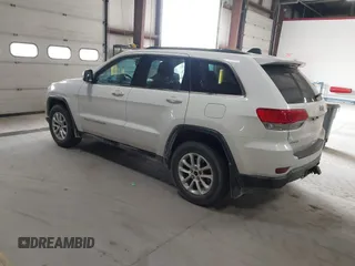 2014 Jeep Grand Cherokee Laredo with VIN 1C4RJFAG4EC309401, listed as a IAAI auction lot 41996233 with 243,541 mi miles and . Bid and sale history available at DreamBid. Image 3.