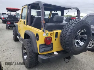 2002 Jeep Wrangler Sport with VIN 1J4FA49S12P746058, listed as a Copart auction lot 75060604 with Not Provided miles and Non Repairable. Bid and sale history available at carsss.com. Image 2.
