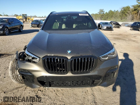 2022 BMW X5 sDrive40i with VIN 5UXCR4C02N9J39621, listed as a Copart auction lot 87696995 with 0 mi miles and Salvage Title. Bid and sale history available at carsss.com. Image 5.