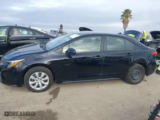 2024 Toyota Corolla Hybrid LE with VIN JTDBCMFE7R3034801, listed as a IAAI auction lot 41773438 with 42,440 mi miles. Bid and sale history available at carsss.com. Image 14.