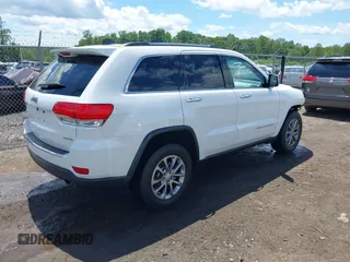 2014 Jeep Grand Cherokee Limited with VIN 1C4RJFBG3EC350648, listed as a IAAI auction lot 42523221 with 125,447 mi miles and . Bid and sale history available at DreamBid. Image 4.