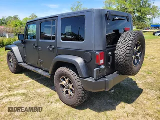 2014 Jeep Wrangler Unlimited Sport with VIN 1C4HJWDG4EL159619, listed as a IAAI auction lot 42176313 with 79,715 mi miles and . Bid and sale history available at DreamBid. Image 3.