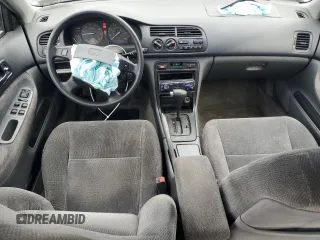 1997 Honda Accord LX with VIN 1HGCD5632VA037747, listed as a Copart auction lot 63532415 with 118,499 mi miles and Salvage title. Bid and sale history available at DreamBid. Image 8.