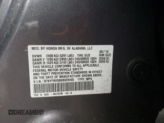 2019 Honda Passport EX-L z VIN 5FNYF8H50KB028465, wystawiony jako Copart lot #56160545 z przebiegiem 100 636 mil mil oraz Szkoda całkowita • Salvage title. Historia ofert i sprzedaży dostępna na DreamBid. Obrazek 13.