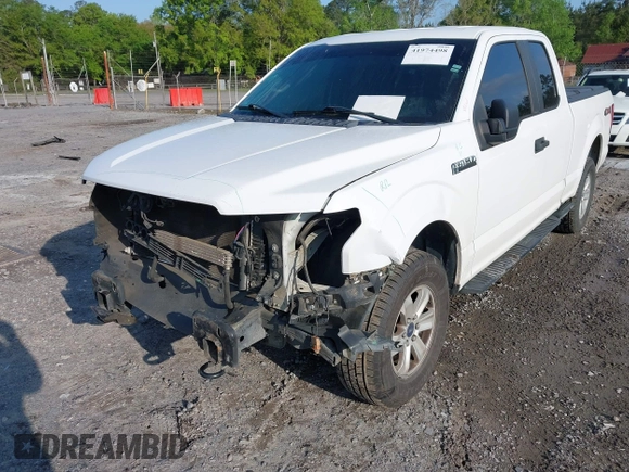 2016 Ford F-150 XLT with VIN 1FTFX1EF4GKE50550, listed as a IAAI auction lot 41974498 with 154,409 mi miles. Bid and sale history available at carsss.com. Image 6.