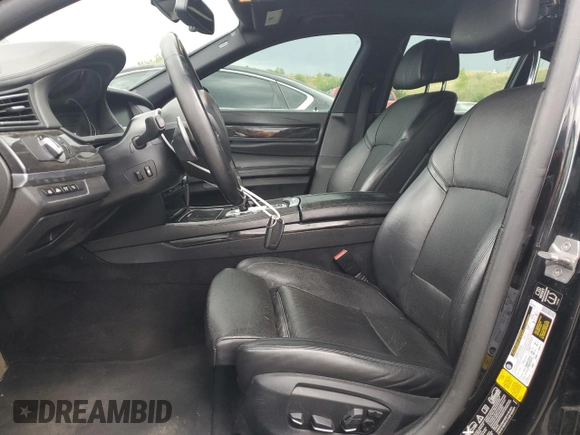 2014 BMW 7 Series 750i xDrive with VIN WBAYB6C56ED224880, listed as a Copart auction lot 72554084 with 115,146 mi miles and Salvage Title. Bid and sale history available at carsss.com. Image 7.