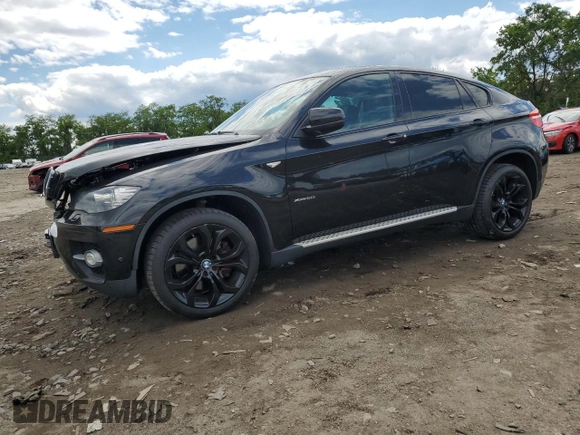 2012 BMW X6 50i z VIN 5UXFG8C51CLZ97393, wystawiony jako Copart lot #58407285 z przebiegiem 128 040 mil mil oraz Szkoda całkowita • Salvage title. Historia ofert i sprzedaży dostępna na DreamBid. Obrazek 1.