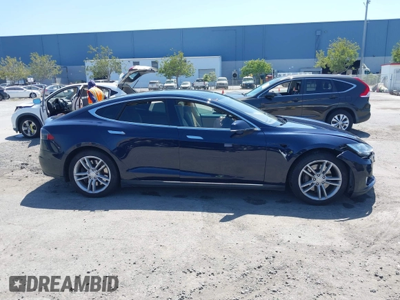 2014 Tesla Model S 60 with VIN 5YJSA1H12EFP46760, listed as a IAAI auction lot 42344596 with 106,252 mi miles and . Bid and sale history available at DreamBid. Image 13.