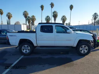 2006 Toyota Tacoma z VIN 5TELU42N66Z176139, wystawiony jako IAAI lot #41343253 z przebiegiem 145 719 mil mil oraz . Historia ofert i sprzedaży dostępna na DreamBid. Obrazek 14.