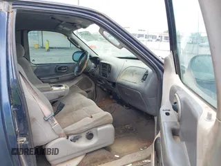 2003 Ford F-150 XL with VIN 1FTRX18W63NA57957, listed as a IAAI auction lot 42514779 with 406,771 mi miles and . Bid and sale history available at DreamBid. Image 5.