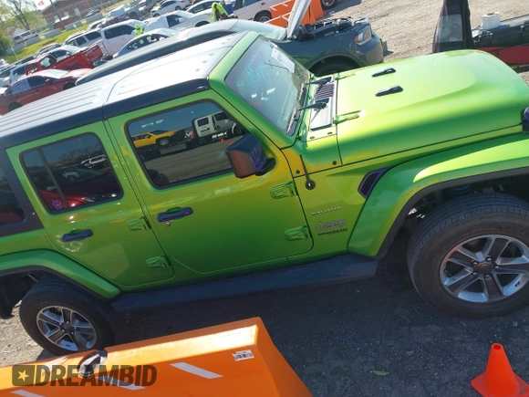 2019 Jeep Wrangler Unlimited Sahara with VIN 1C4HJXEN1KW592876, listed as a IAAI auction lot 42039474 with 66,506 mi miles and . Bid and sale history available at DreamBid. Image 14.