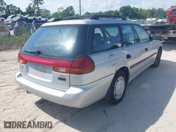 1996 Subaru Legacy L with VIN 4S3BK4352T6318494, listed as a IAAI auction lot 42162704 with 272,055 mi miles and . Bid and sale history available at DreamBid. Image 4.