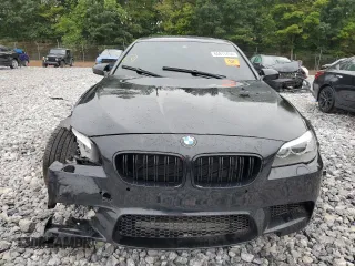 2013 BMW M5 with VIN WBSFV9C53DD096852, listed as a Copart auction lot 65917404 with 0 mi miles and Salvage Title. Bid and sale history available at carsss.com. Image 5.