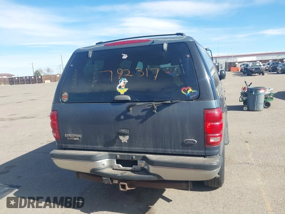 1999 Ford Expedition XLT z VIN 1FMPU18L2XLB43236, wystawiony jako IAAI lot #41792317 z przebiegiem 157 636 mil mil oraz . Historia ofert i sprzedaży dostępna na DreamBid. Obrazek 17.