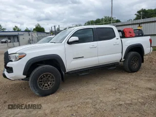 2023 Toyota Tacoma SR z VIN 3TMCZ5AN9PM567230, wystawiony jako Copart lot #58859135 z przebiegiem 20 595 mil mil oraz Czysty tytuł • Clean title. Historia ofert i sprzedaży dostępna na DreamBid. Obrazek 1.