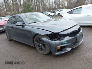 2015 BMW 4 Series 428i z VIN WBA3V5C56FP753337, wystawiony jako IAAI lot #41959843 z przebiegiem 68 086 mil mil oraz . Historia ofert i sprzedaży dostępna na DreamBid. Obrazek 1.