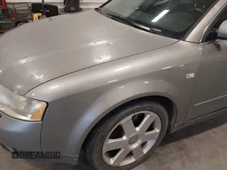 2003 Audi A4 z VIN WAUVT68E93A165833, wystawiony jako IAAI lot #42351966 z przebiegiem 153 541 mil mil oraz . Historia ofert i sprzedaży dostępna na DreamBid. Obrazek 12.
