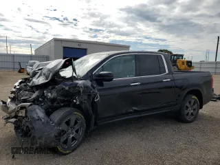 2020 Honda Ridgeline RTL-E с VIN 5FPYK3F75LB007784, выставлен на аукционе Copart как лот 58641065 с пробегом 52 581 миль миль и Списание • Salvage title. История ставок и продаж доступна на DreamBid. Изображение 1.