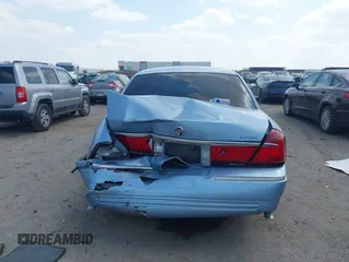 2000 Mercury Grand Marquis LS z VIN 2MEFM75W1YX673105, wystawiony jako IAAI lot #42050980 z przebiegiem 154 944 mil mil oraz . Historia ofert i sprzedaży dostępna na DreamBid. Obrazek 16.