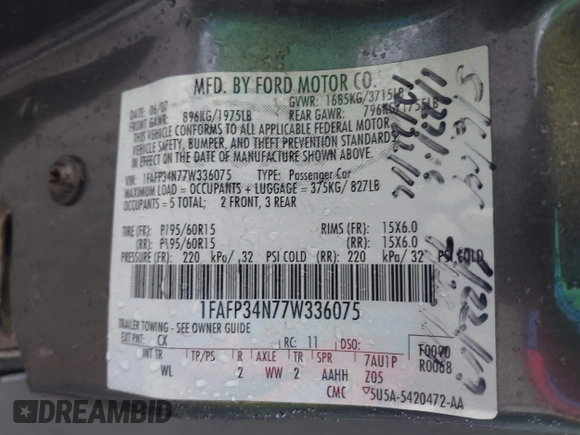 2007 Ford Focus S z VIN 1FAFP34N77W336075, wystawiony jako IAAI lot #42325783 z przebiegiem 153 194 mil mil oraz . Historia ofert i sprzedaży dostępna na DreamBid. Obrazek 9.